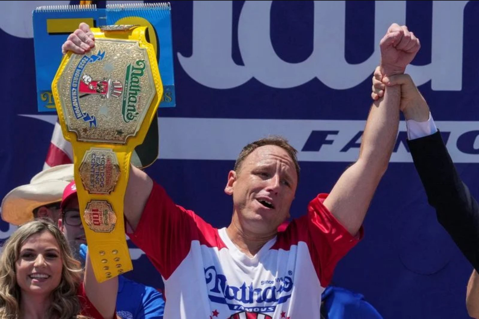 Joey Chestnut Retains Mustard Belt, Attributes Lower Total to Intense Heat
