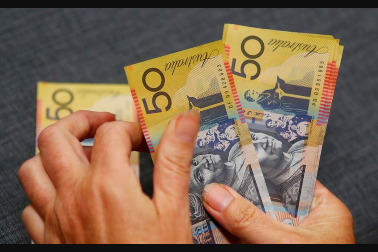 Australian pension fund increases currency hedging, says AUD undervalued as RBA tightens