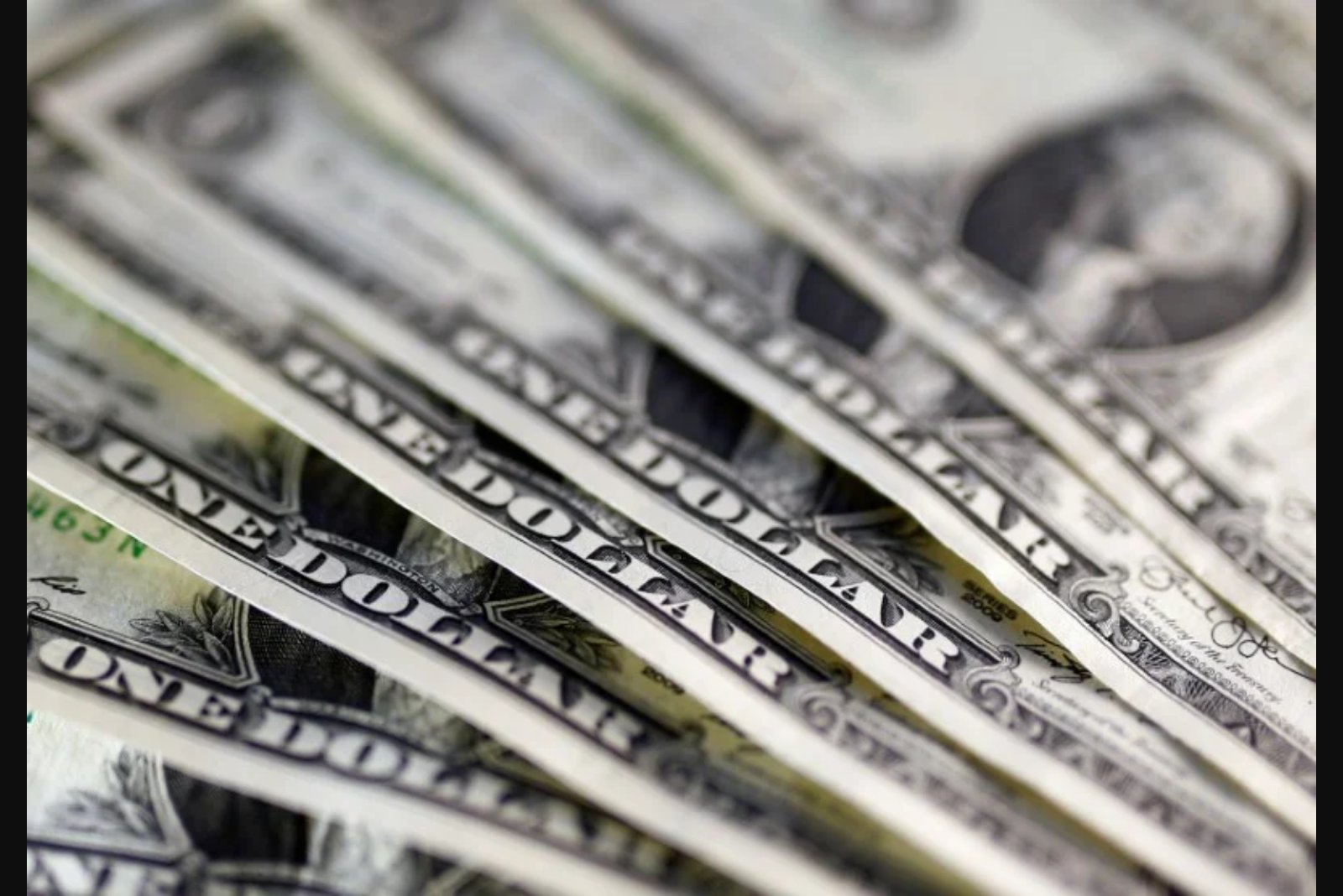 Taiwan dollar edges lower as foreign investors persist with equity withdrawals