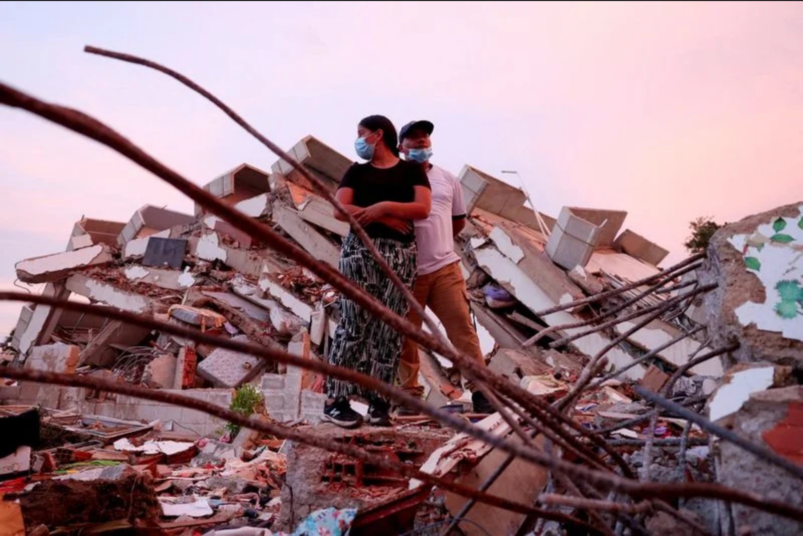 Young volunteers run quake shelters as survivors and homeless share classrooms in La Guaira