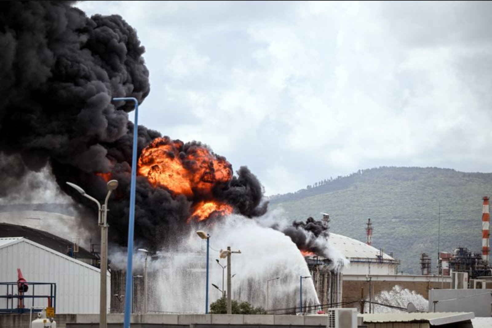 Crude Tanker Ablaze Off Dubai After Drone Strike as U.S. Threatens Iran's Energy Infrastructure