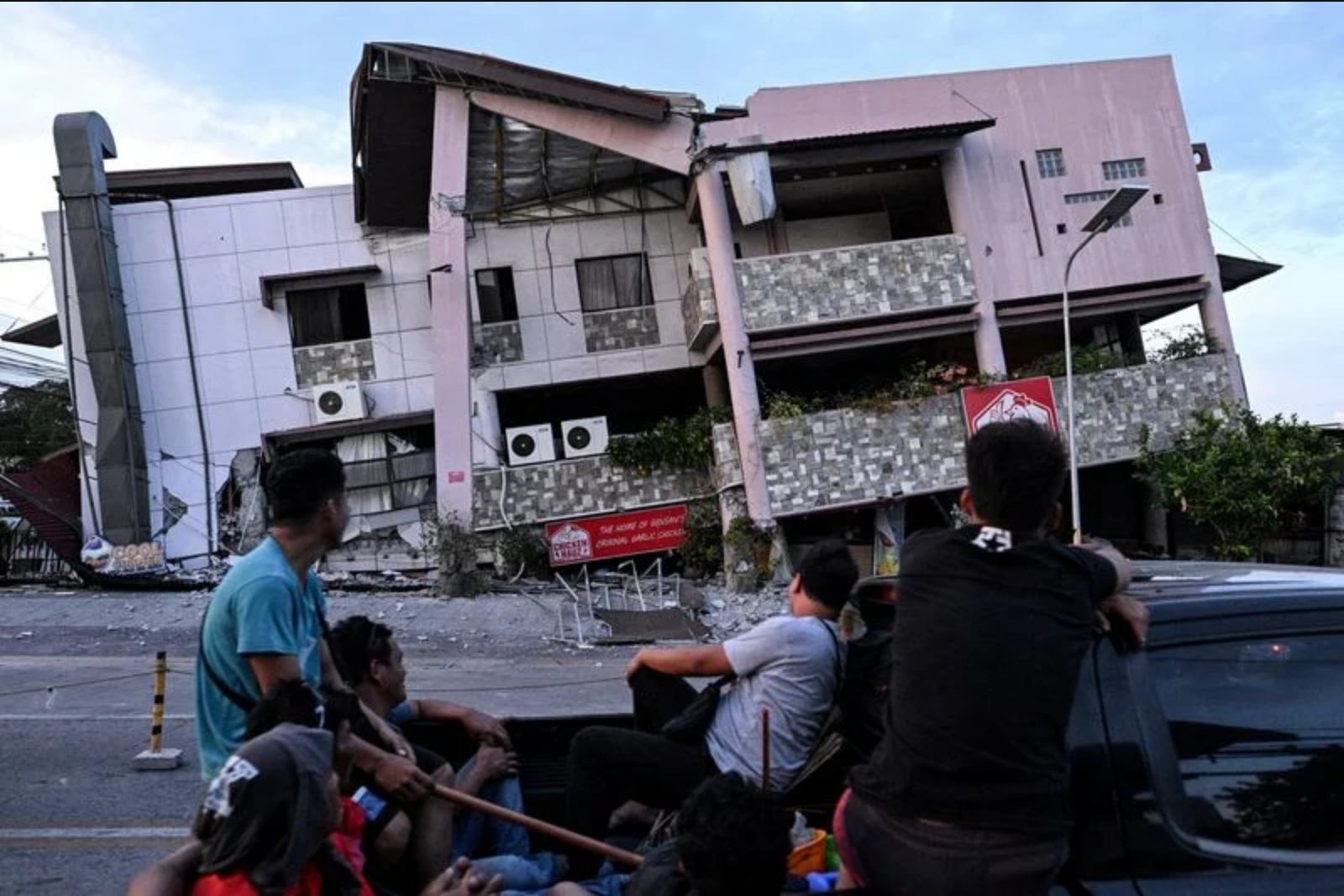 Rescue teams race to reach people believed trapped after powerful quake flattens parts of General Santos